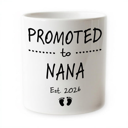 The image is a white ceramic mug with black text and footprint graphics.
