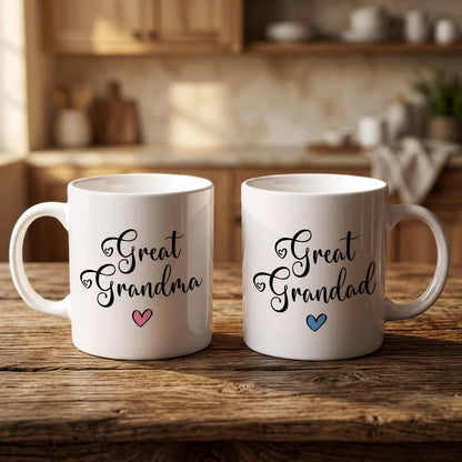 Two white mugs with black text and heart symbols, placed on a wooden surface.