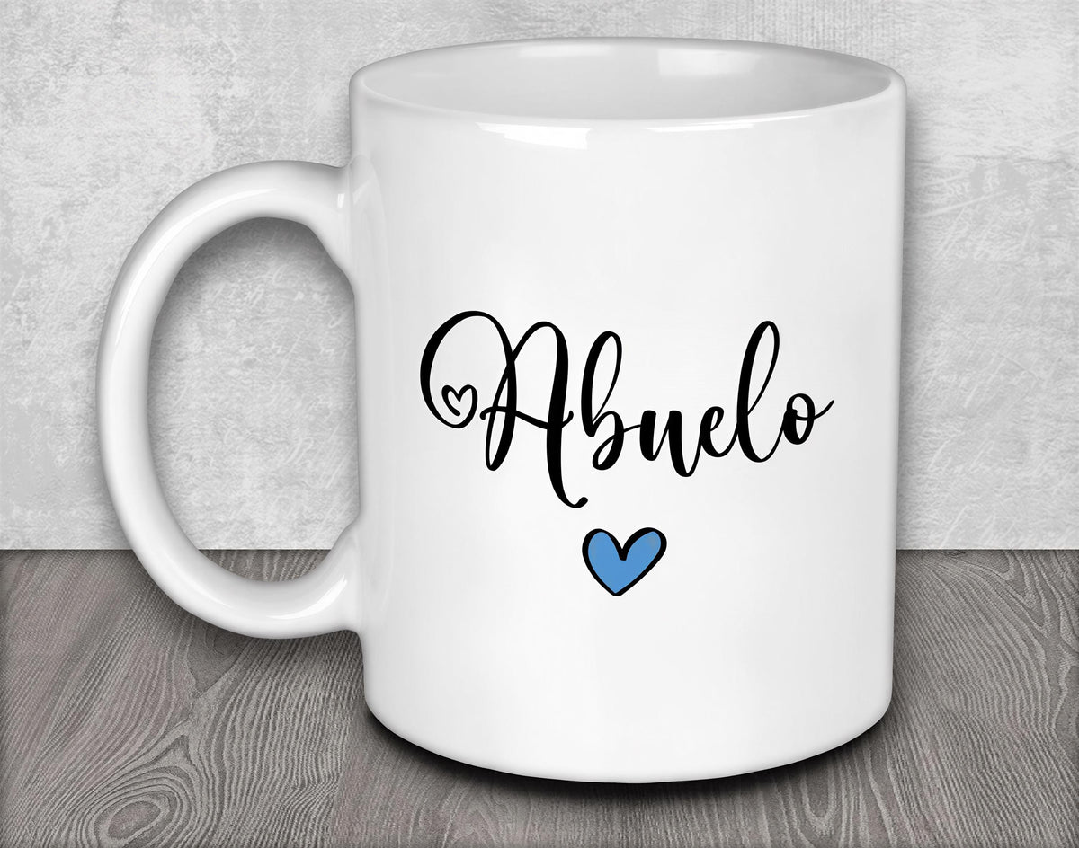 a white coffee mug with a blue heart on it