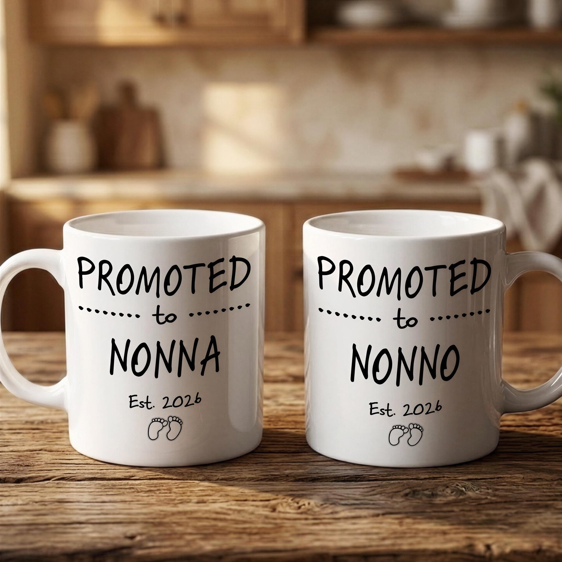 Two white mugs with black text that reads "PROMOTED TO NONNA Est. 2026" and "PROMOTED TO NONNO Est. 2026" printed on them.