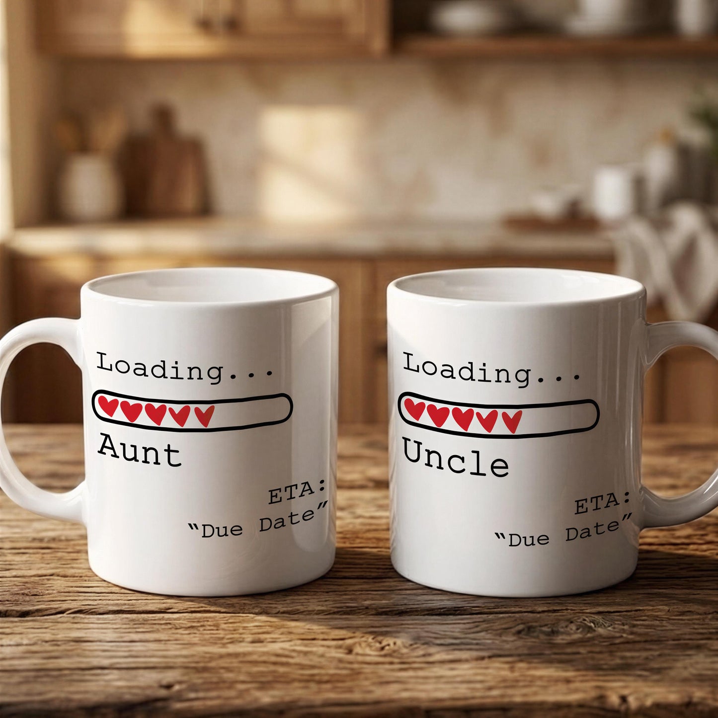 Two white mugs with text and graphics on them, placed on a wooden surface.