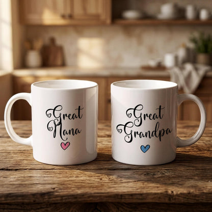 Two white mugs with black text and heart symbols, placed on a wooden surface.