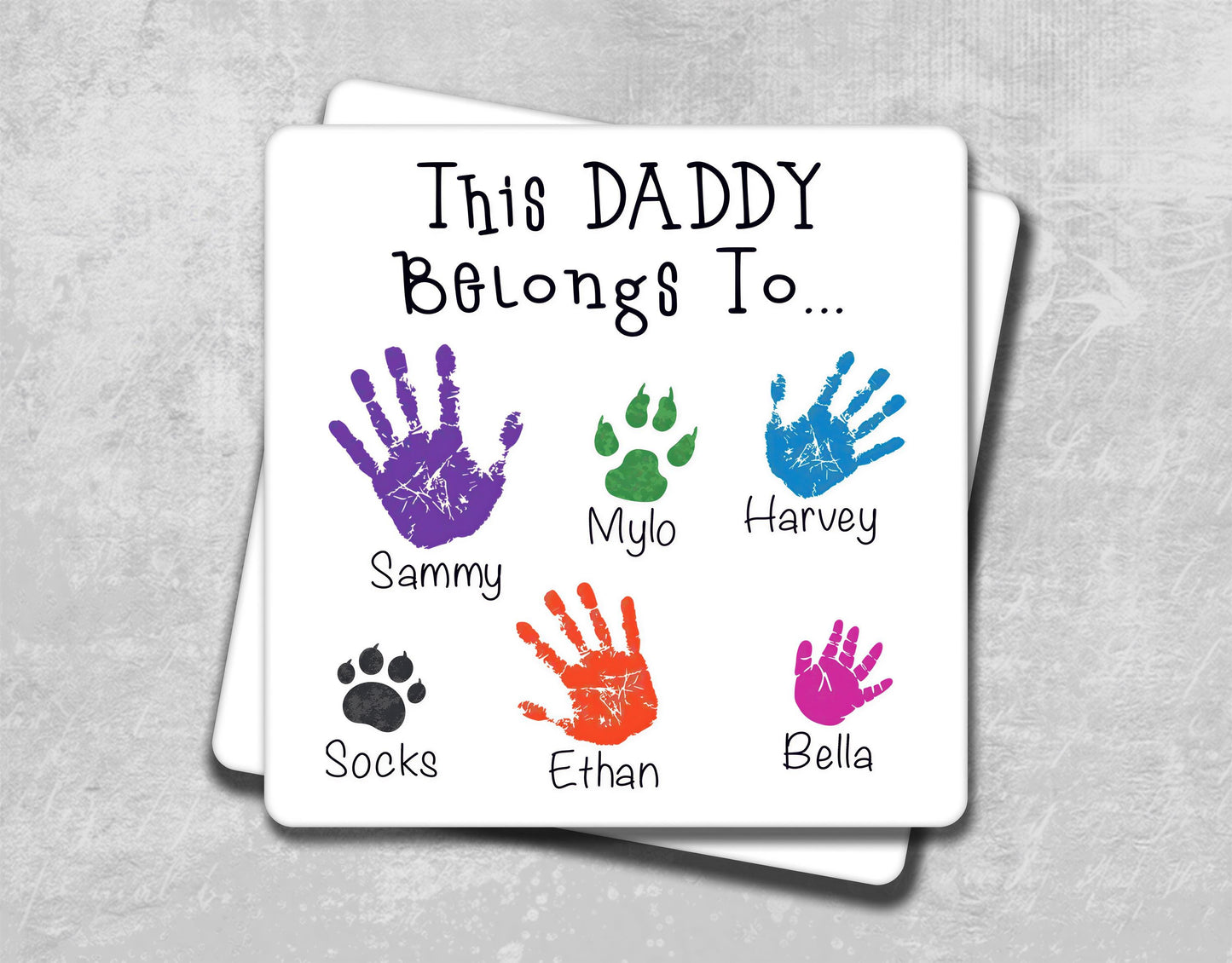 a coaster with a handprint of different colors