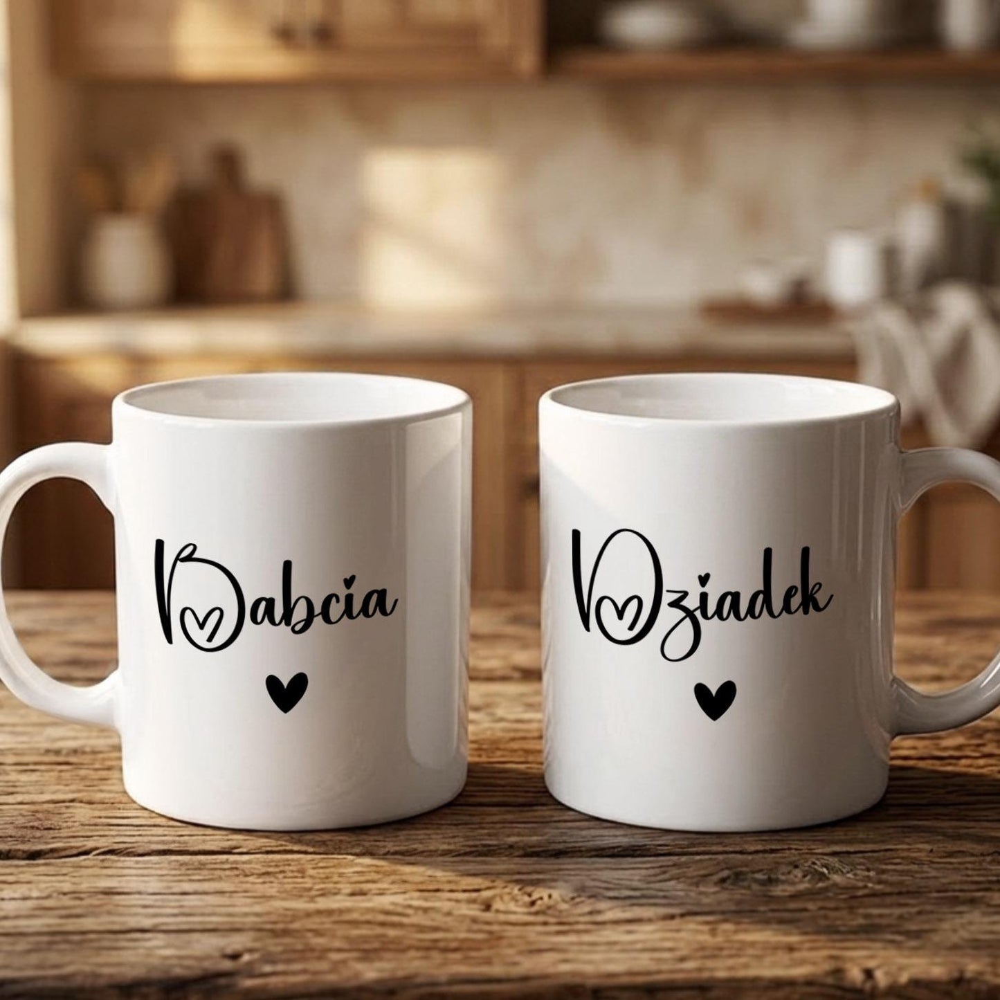Two white mugs with black text and heart symbols, placed on a wooden surface.