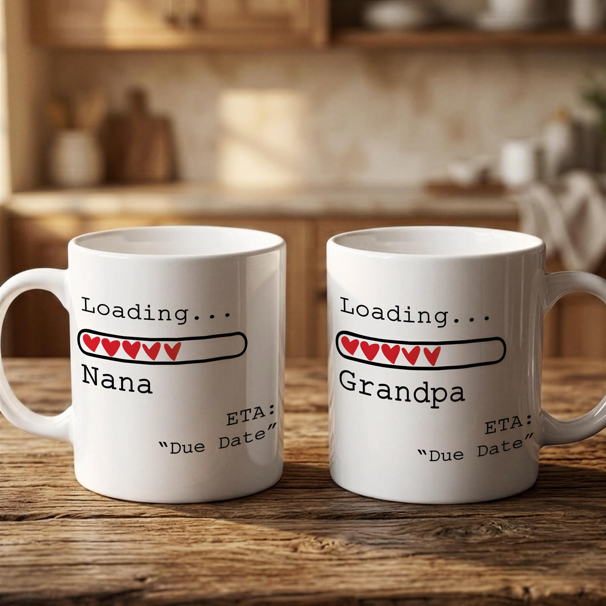 Two white mugs with text and graphics on them, placed on a wooden surface.