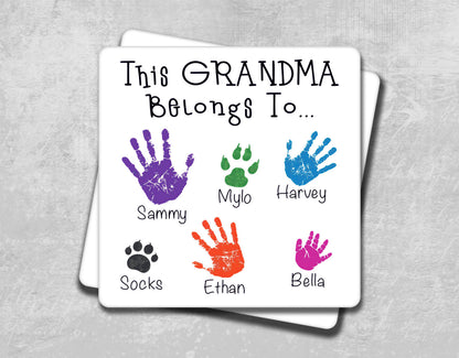 this grandma belongs to hand prints on a coaster